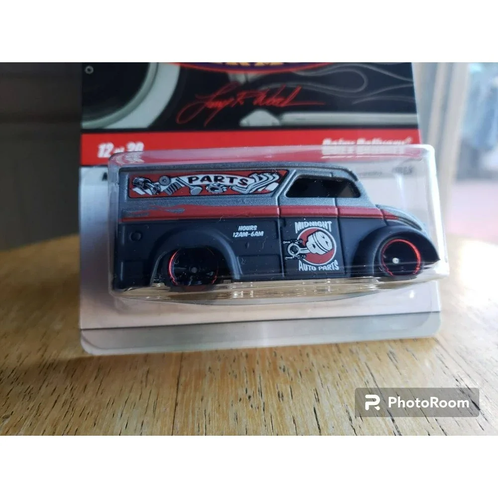 2009 Hot Wheels DAIRY DELIVERY Larry's Garage Metalflake Matte Black 12/20 1:64